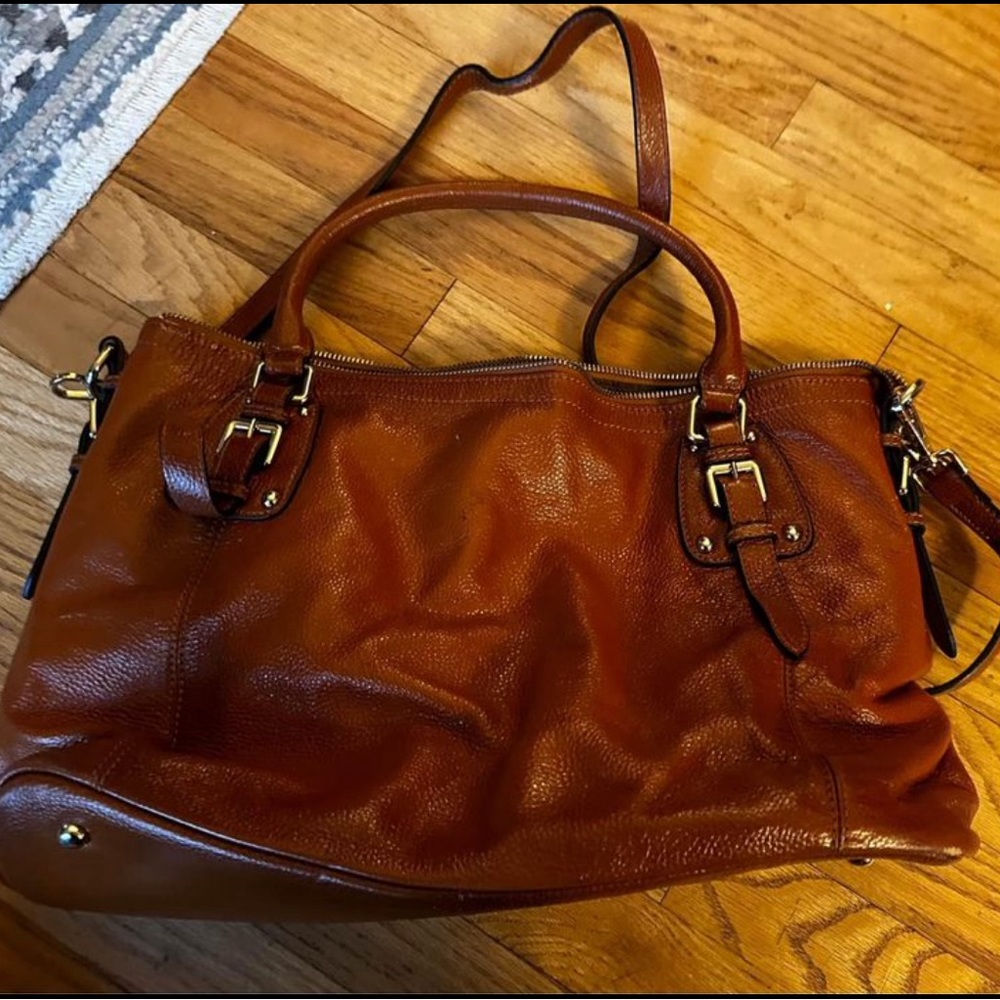 Large leather bag that fits a laptop.